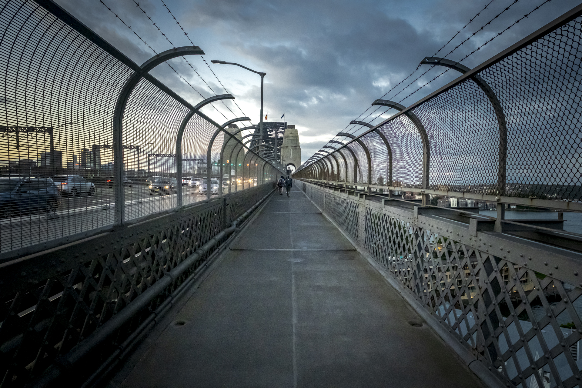 Watching as the grey clouds shadow the bay. by Ant Cummins 2024